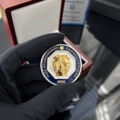 Серебряная литая монета с гербом