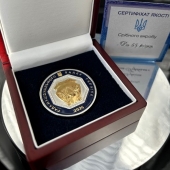 Серебряная литая монета с гербом
