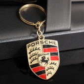 Золотой брелок c логотипом Porsche