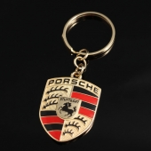 Золотой брелок c логотипом Porsche