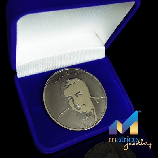 Монета из латуни с портретом