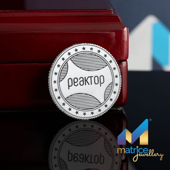Срібна монета з Логотипом Фірми Реактор