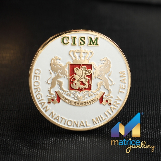 Сувенірна монета з гербом CISM